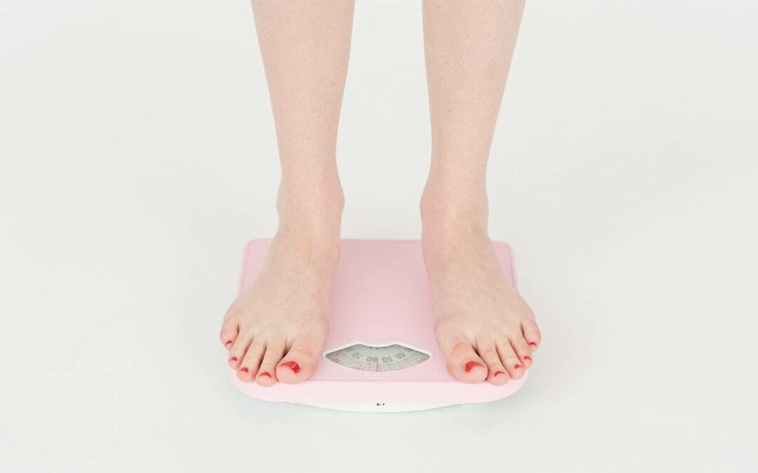 standing on a weighing scale