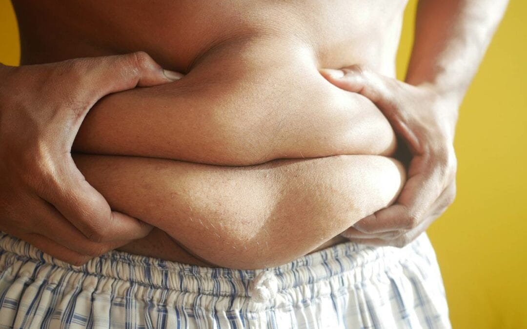 squeezing belly fat